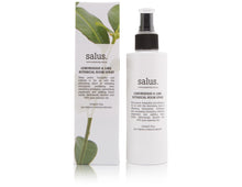 Load image into Gallery viewer, A white bottle of Salus Lemongrass and Lime Botanical Room Spray with a black spray nozzle, next to its packaging box with a green leaf and white background. The label on the bottle reads 'Lemongrass &amp; Lime', and the box has product information and the brand name 'Salus'.